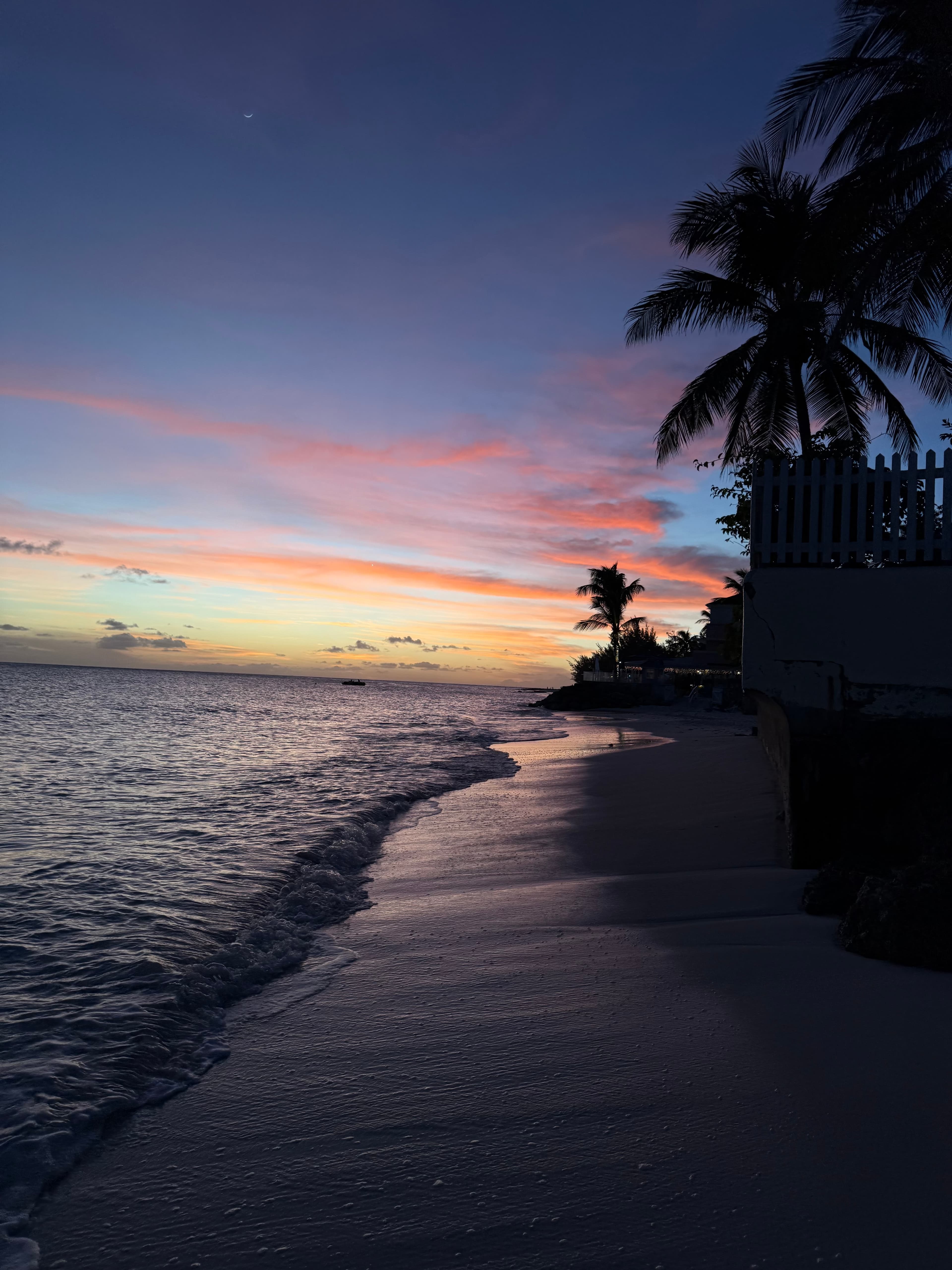Sunset shoreline along the nearby South Coast beach, about a two-minute walk from Maxwell Park Apartments.